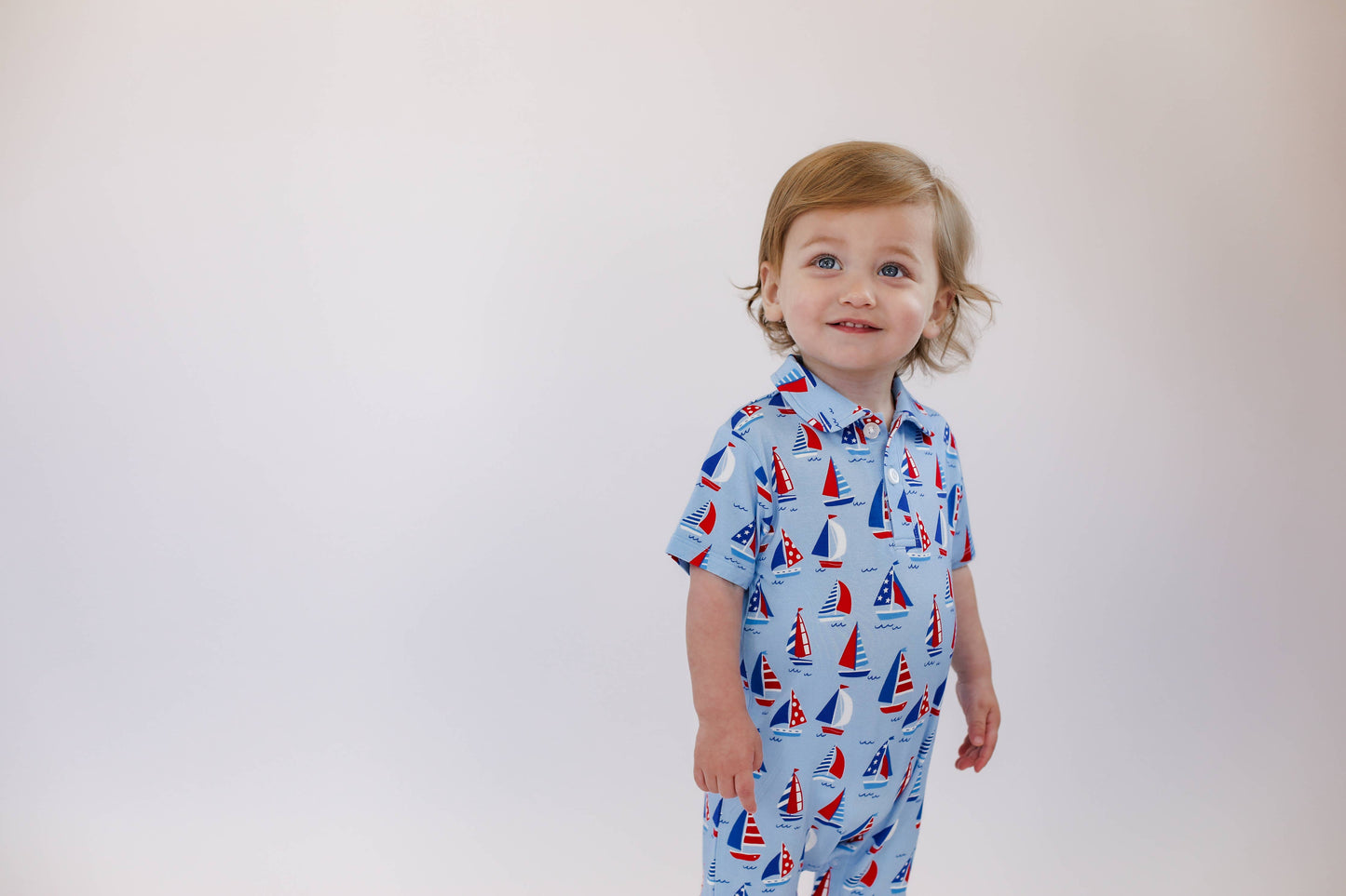 Sail Away Short Sleeve Polo Romper