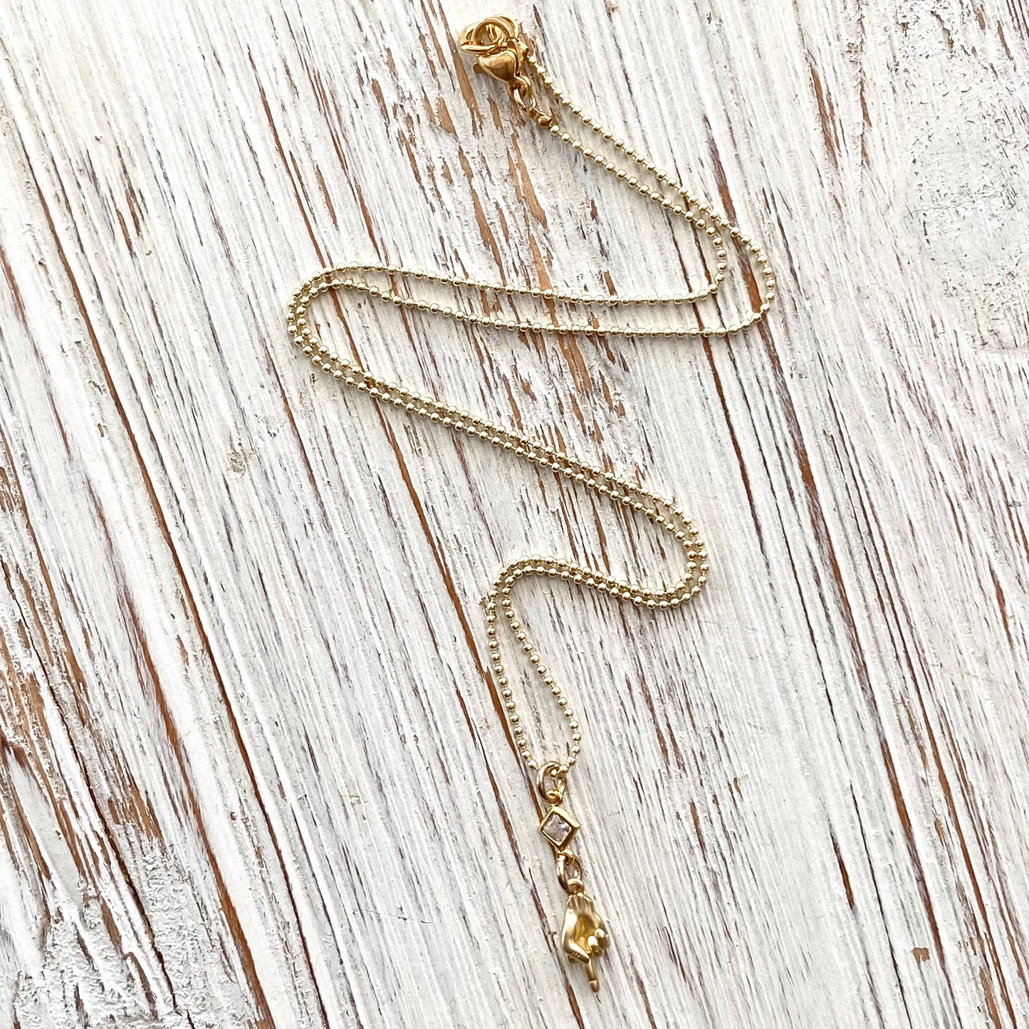 Middle finger necklace, boutique , salon, trendy