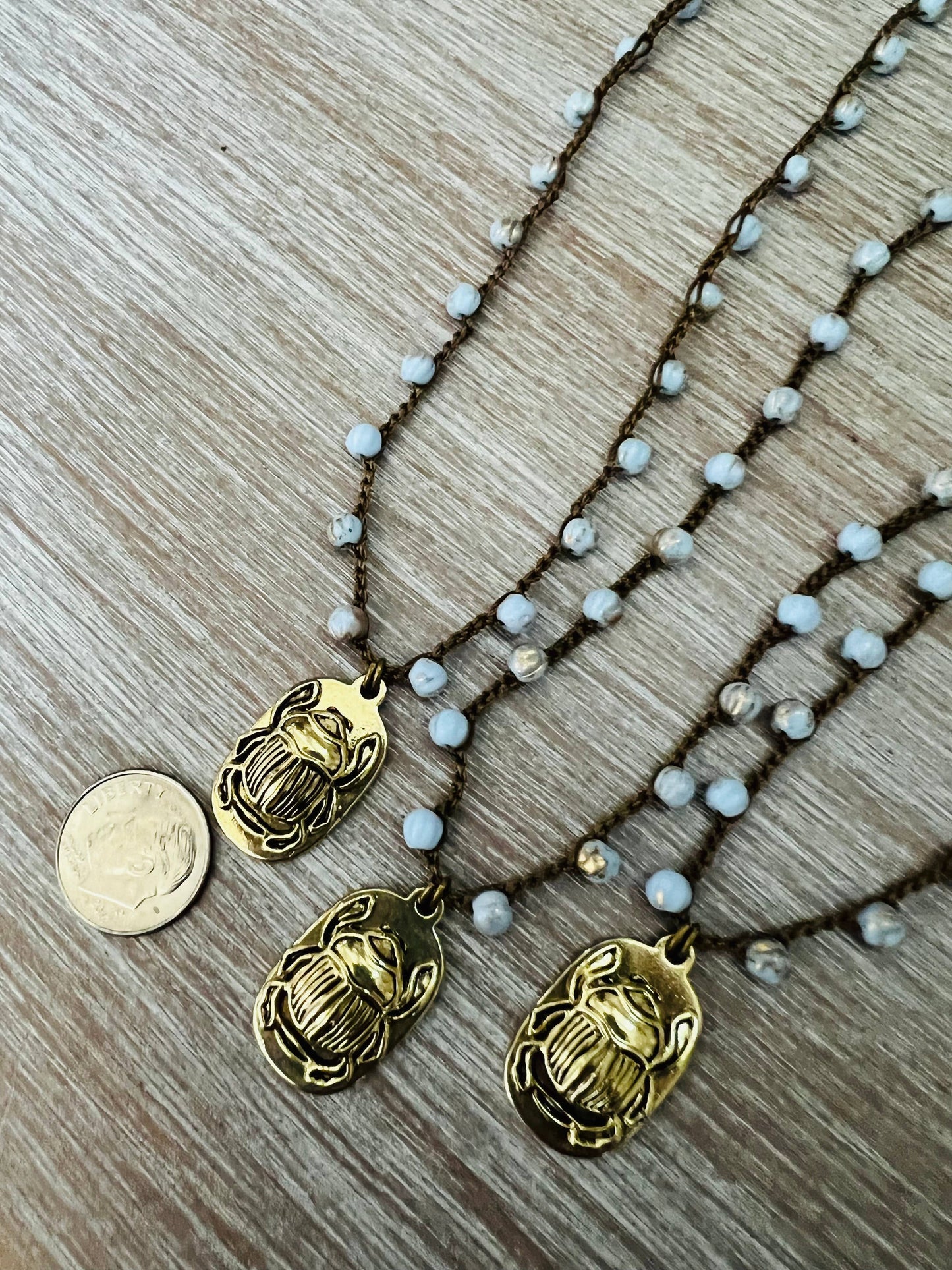 Golden Scarab Charm Necklace With Lavender Crystal Strand