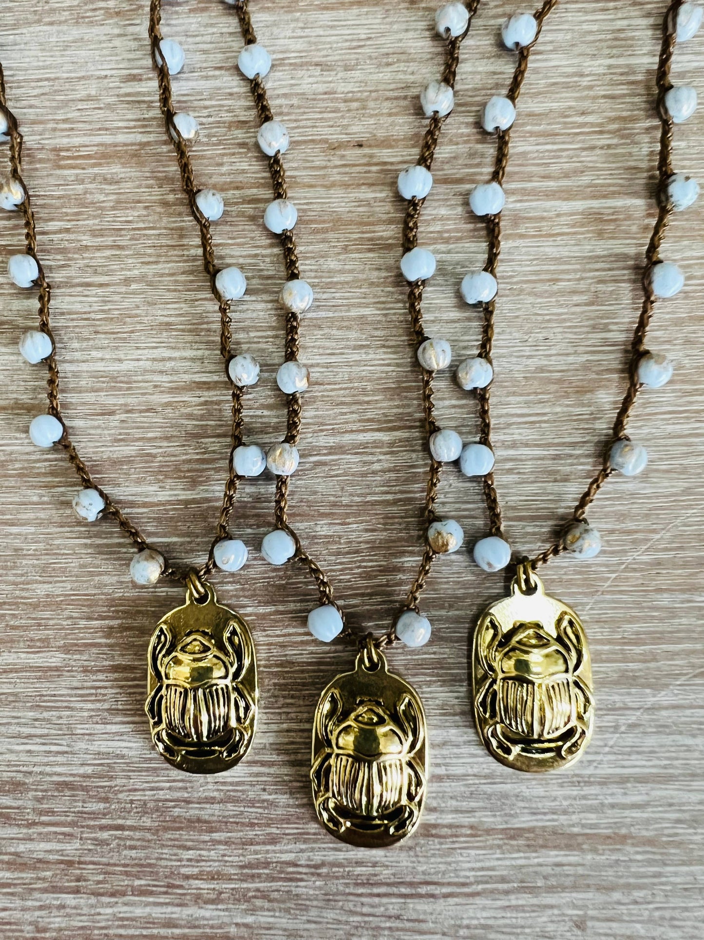 Golden Scarab Charm Necklace With Lavender Crystal Strand