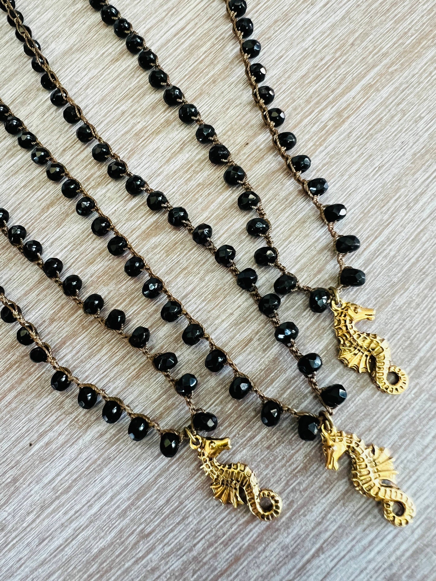 Seahorse Charm Necklace On Jet Black Crochet Crystal Strand