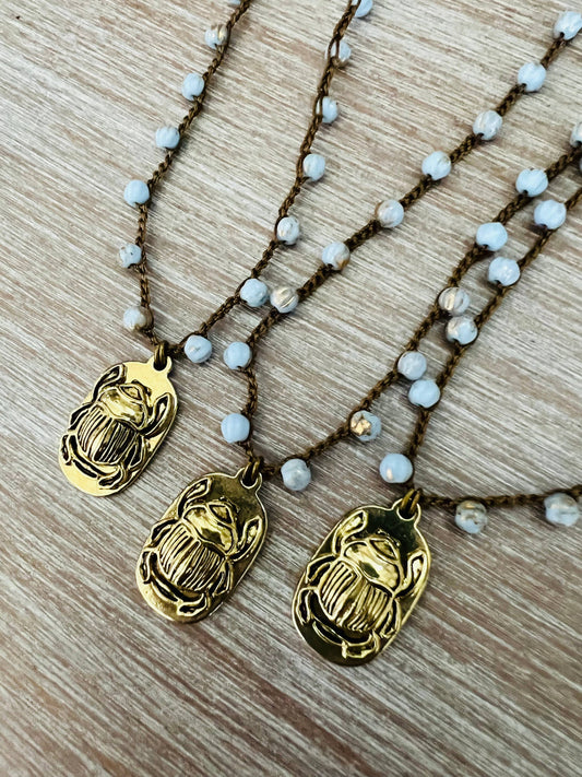Golden Scarab Charm Necklace With Lavender Crystal Strand