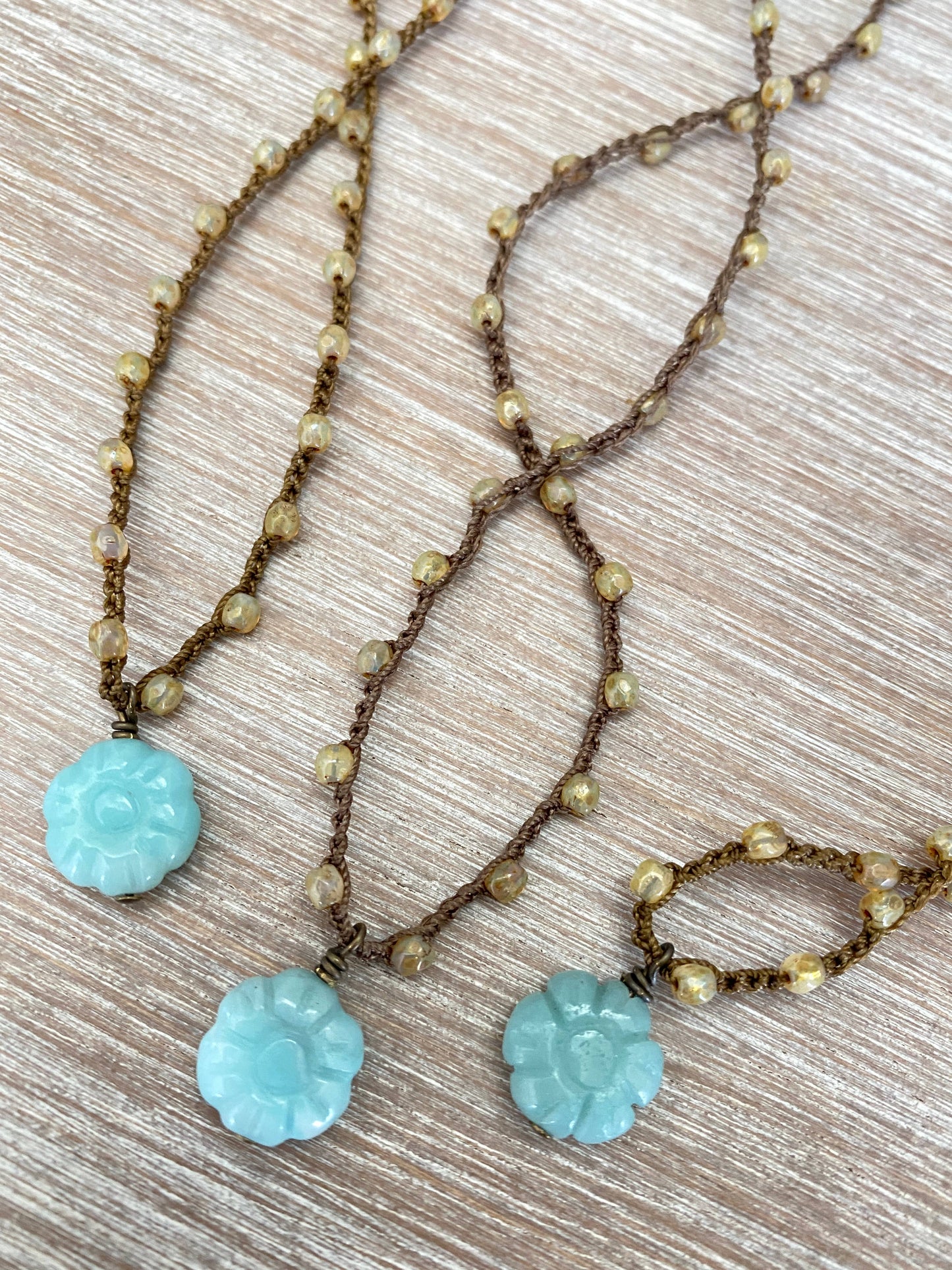Carved Stone Amazonite Flower On Crocheted Crystal Strand